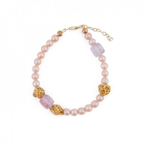 Yellow gold plated sterling silver bracelet with peach fresh water pearls.