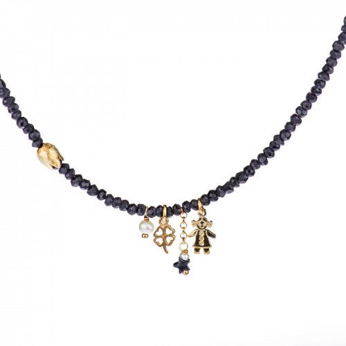 Spinel beads necklace with yellow gold plated sterling silver charms.